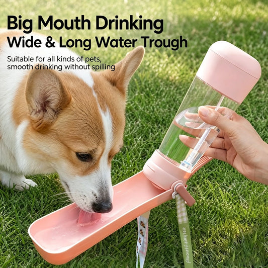 Corgi drinking from the wide trough of a leak-proof dog water bottle for walking